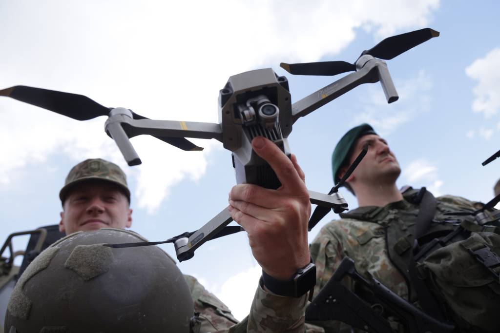 U.S. Army Spc. Sean Curl enters data into a new reconnaissance system during class held by the 1014th Sapper Company.