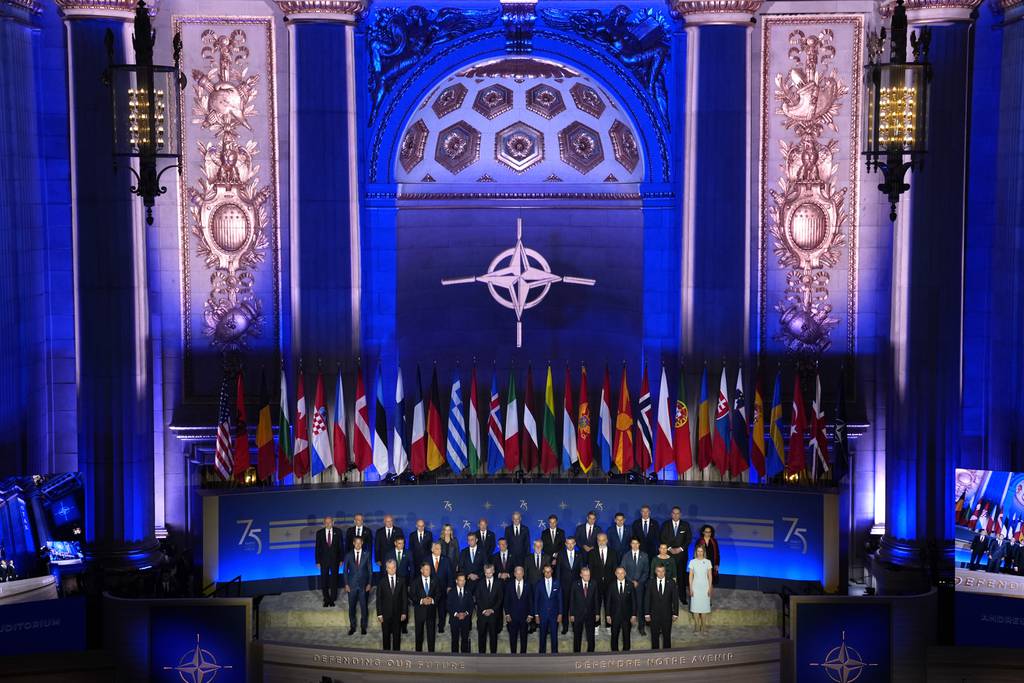 The NATO and Ukrainian flag are pictured in Vilnius, Lithuania on July 9, 2023, a few days ahead of a July 11-12 NATO Summit.