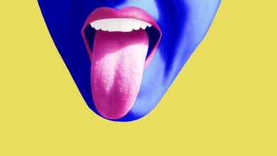 a colorful illustration of a face with a tongue sticking out