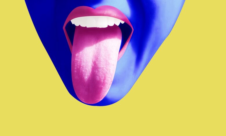 a colorful illustration of a face with a tongue sticking out