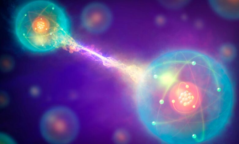 Two red nuclei are surrounded by blue glowing balls and connected together by yellow and purple lines, all against a purple background