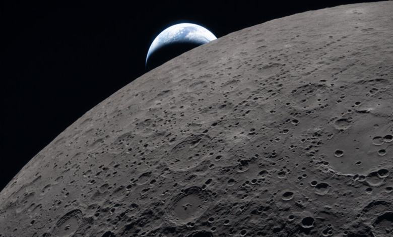 an image of the Earth setting behind the moon