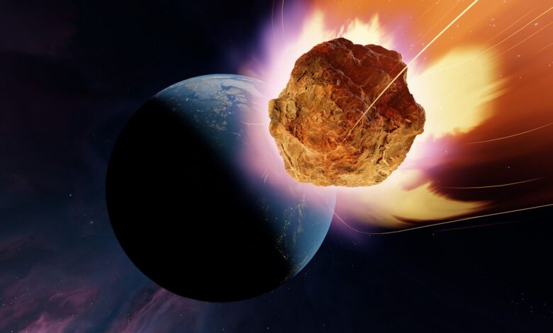 An illustration of a glowing rocky asteroid headed towards a blue planet in shadow.