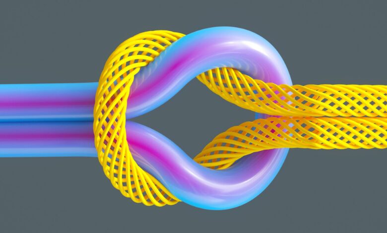 A 3D illustration of a knot, where the two cords on the left are purple and blue and form a loop with two cords on the right which are made of 3D yellow mesh.
