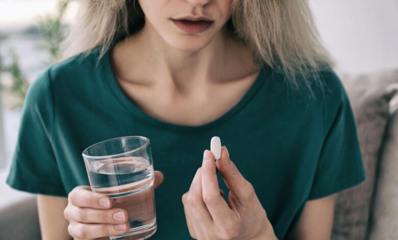 Woman Taking Pill Antidepressant
