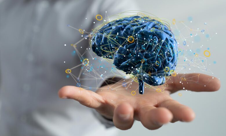 Hand Holding Digital Human Brain Idea
