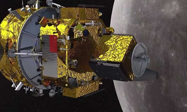 An illustration of a spacecraft covered in gold foil next to the moon in space