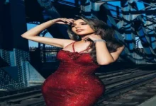 جنات تخطف الأنظار بفستان أحمر ناري في أحدث ظهور لها